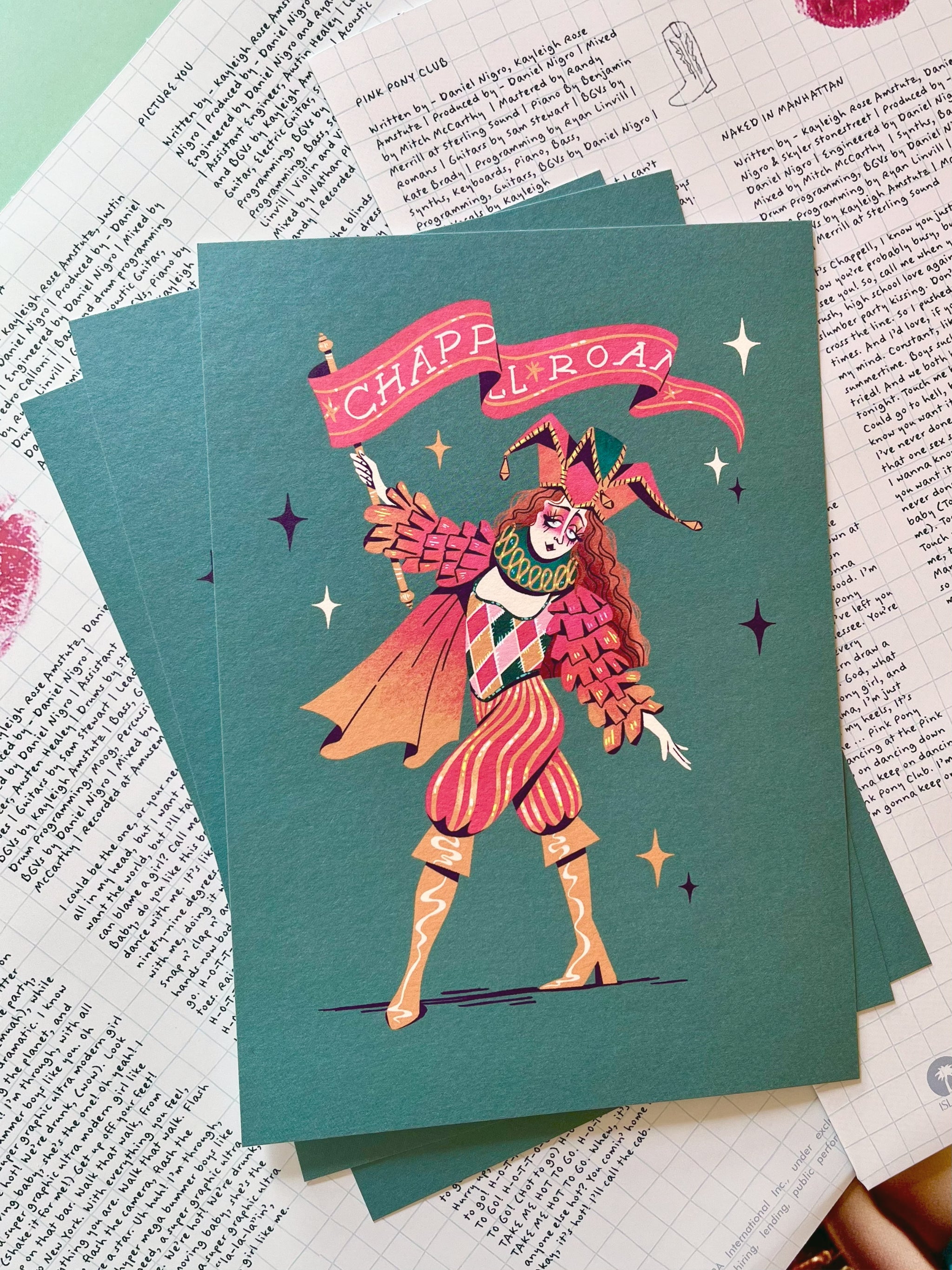Chappell Roan print -- stack of three greeting cards with a colorful illustration of a character holding a banner on a textured surface.