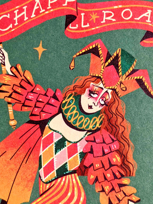 Chappell Roan print -- close-up of a colorful illustration of a jester character with a banner above on a green background.
