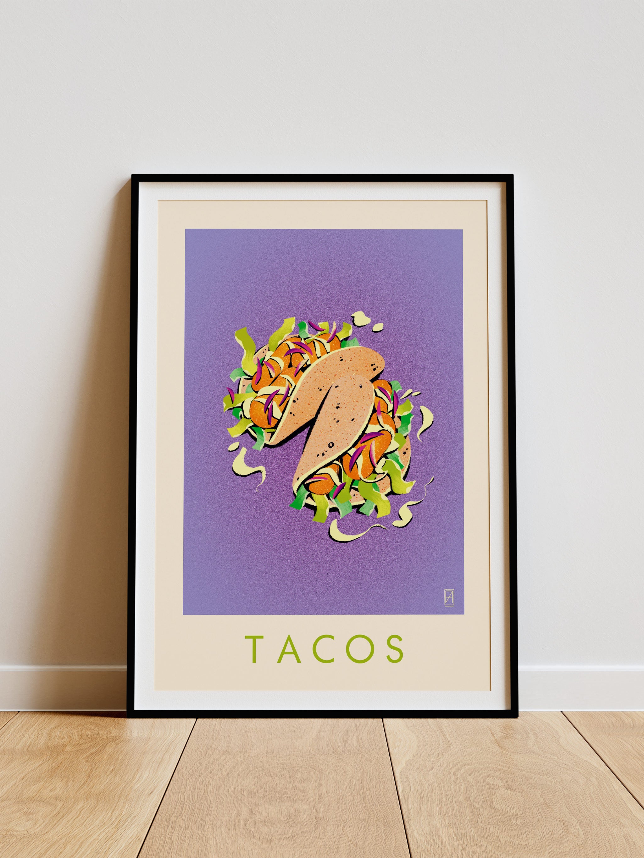 Taco print -- framed artwork of a taco with colorful toppings on a purple background, leaning against a white wall.